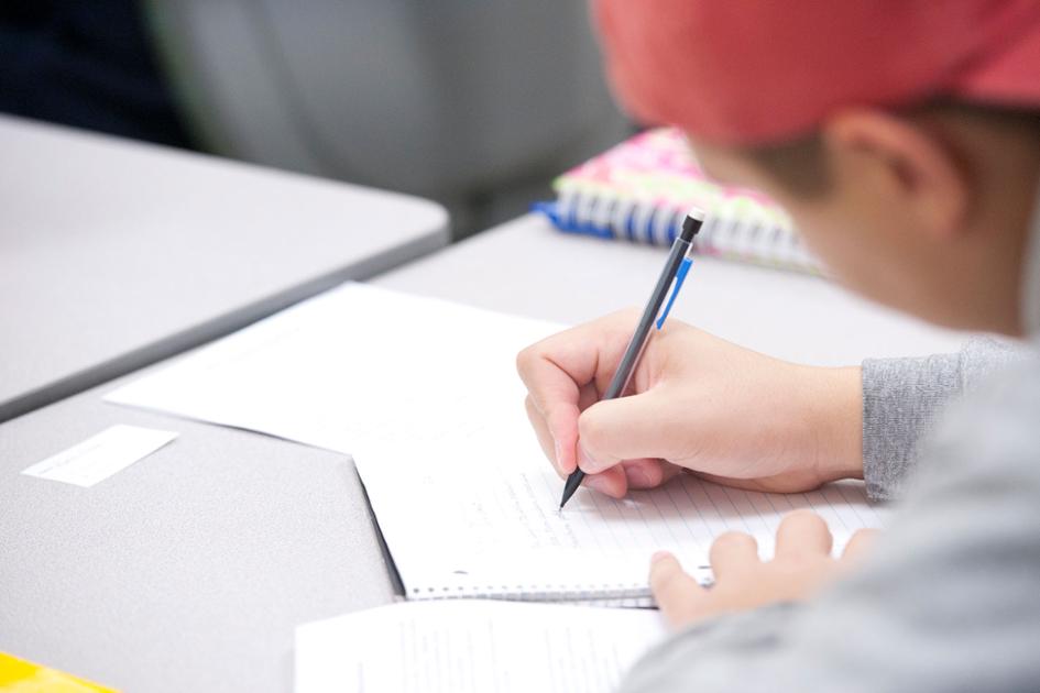 Student Taking Notes