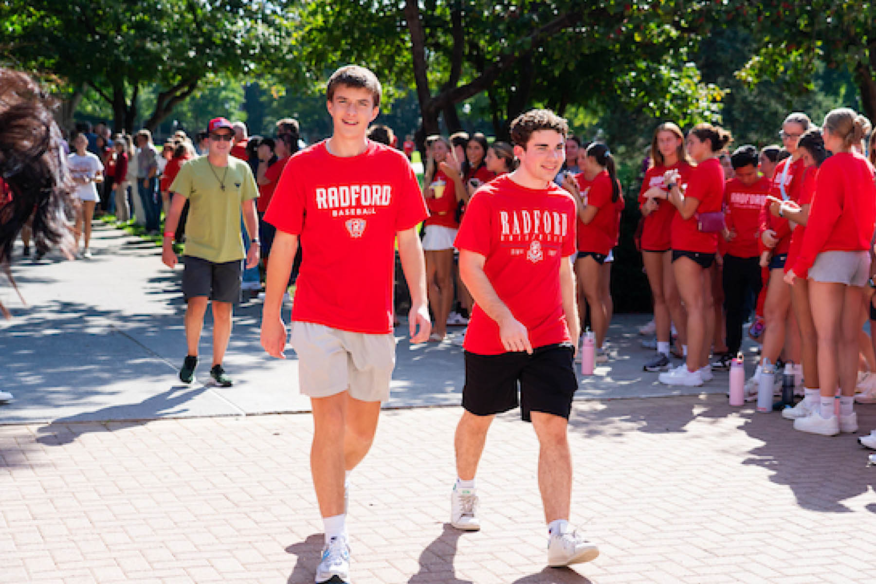 two students walking on campus