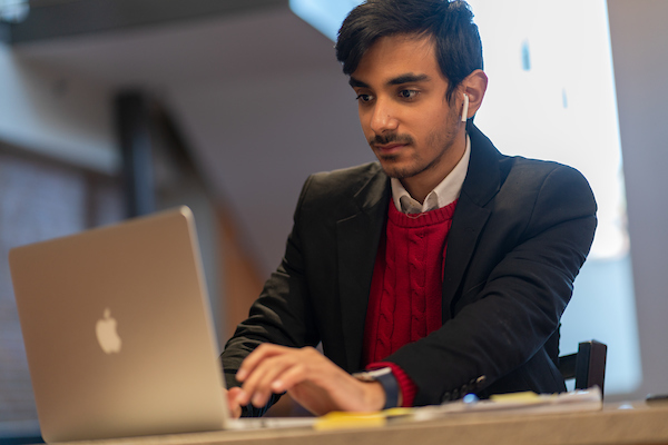 student at laptop