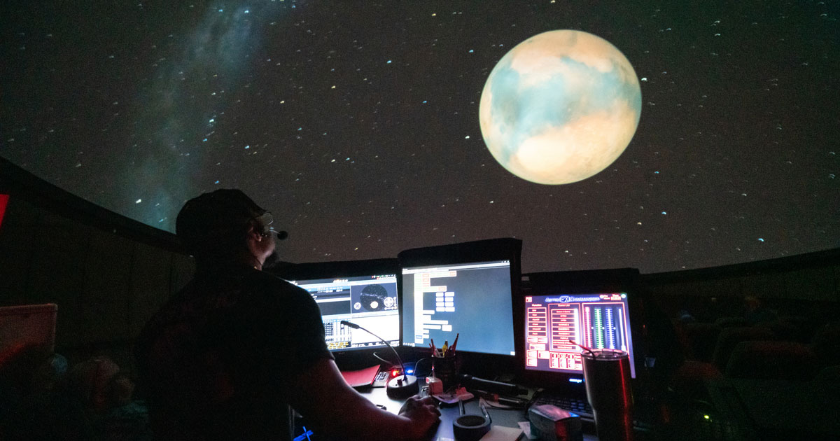 Radford University Planetarium operator watches the show on the dome