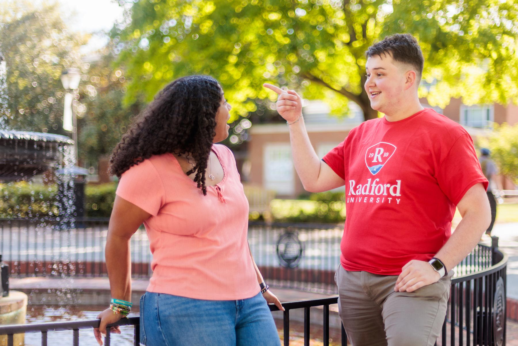 students at fountain talking