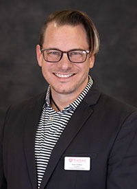 Headshot of Evan Collins