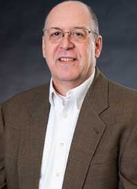 Headshot of Joel Newman