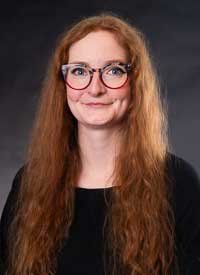 Headshot of Marta-Edith Saul