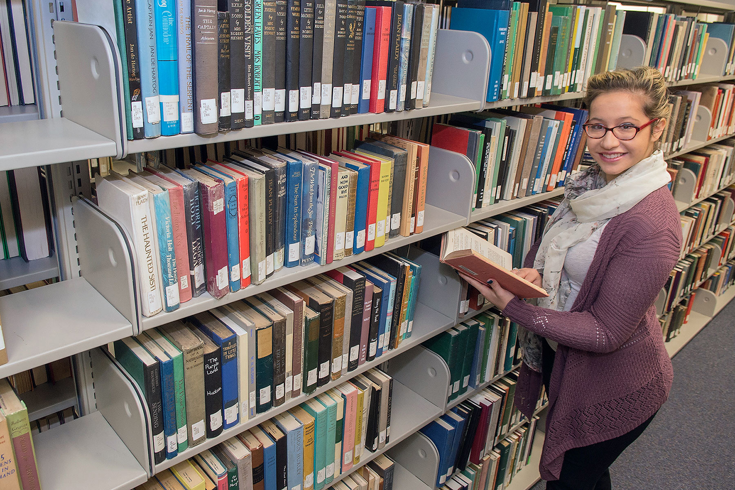 student with books