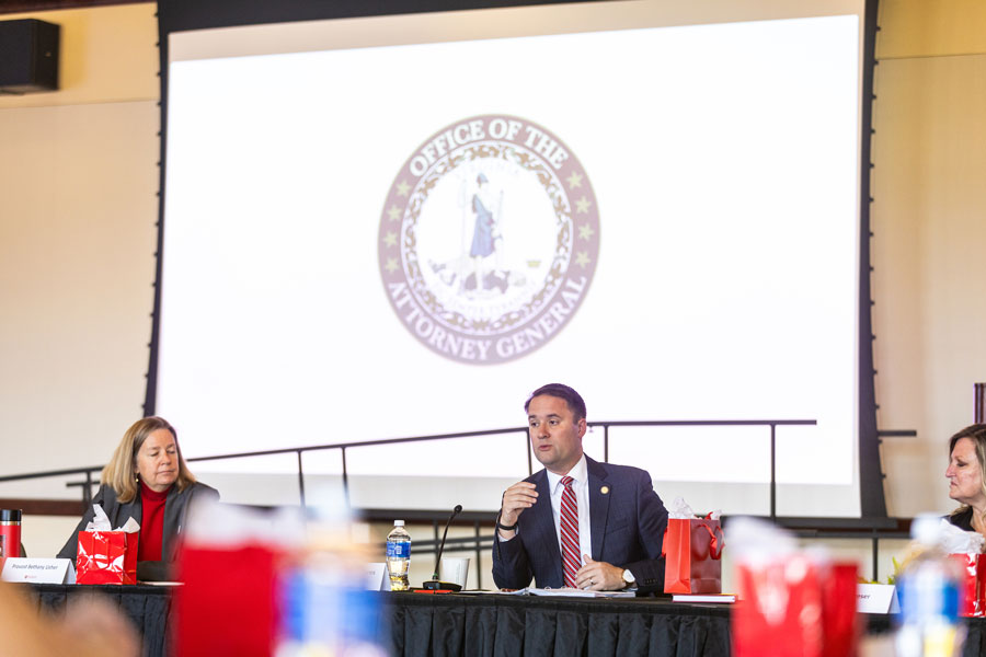 The Attorney General speaks to a crowd at a roundtable discussion on campus.