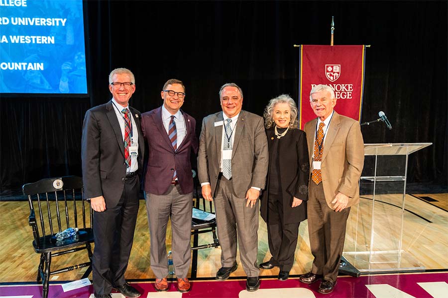 The presidents of five local universities, including Radford's Bret Danilowicz, stand together at the close of the Future of Talent Summit