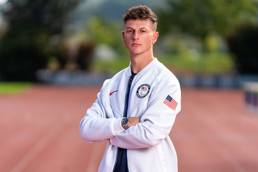 Nick Mayhugh standing on the track at Cupp Stadium at Radford University. 