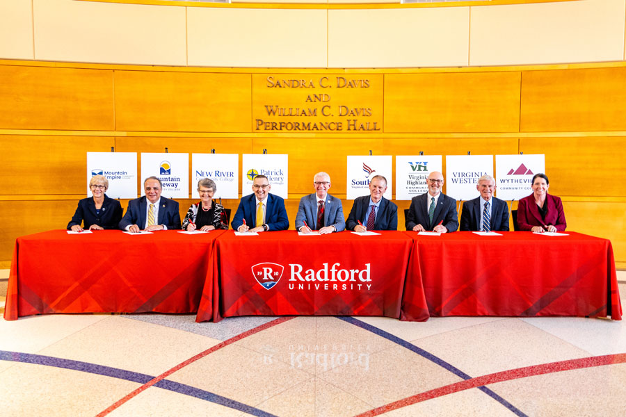 Community College presidents from eight colleges in Virginia join at Radford University to sign the Tartan Transfer agreement.