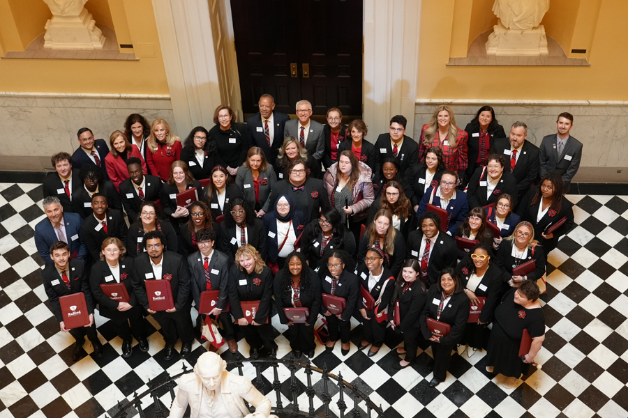 Radford University students, administrators and board of visitors members pose for a group photo in the Virginia State Capitol during Advocacy Day 2025..