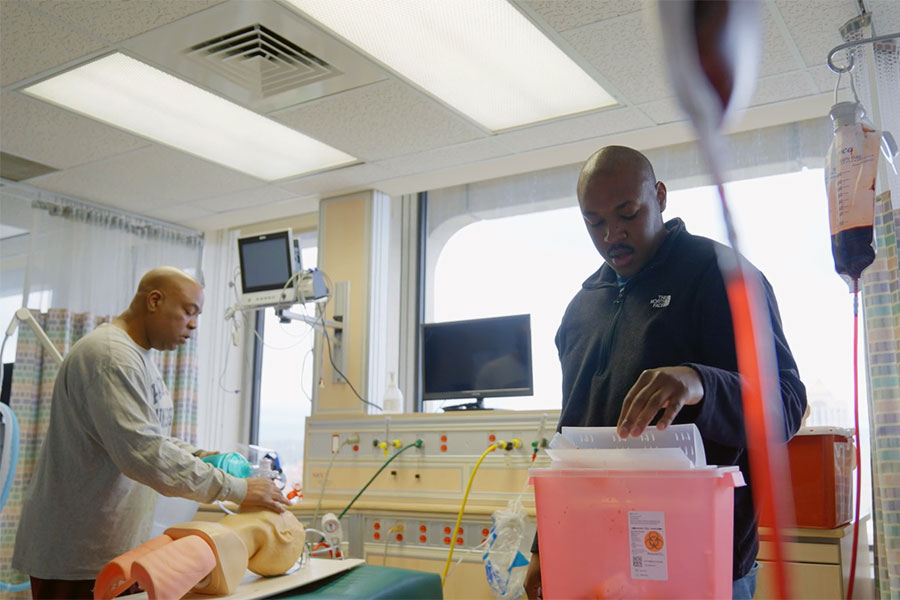 Father and son in respiratory therapy program together