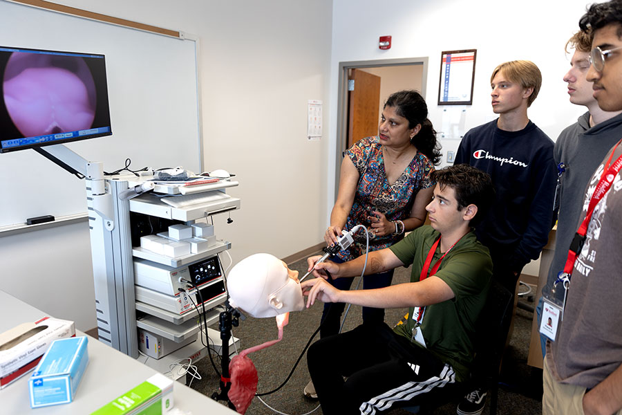 Students from the Governor’s Summer Residential School for Medicine and Health Sciences practice their skills
