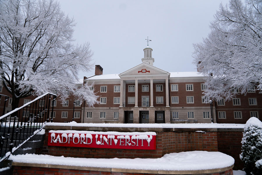 An early snow blankets Radford University's campus in early December 2025