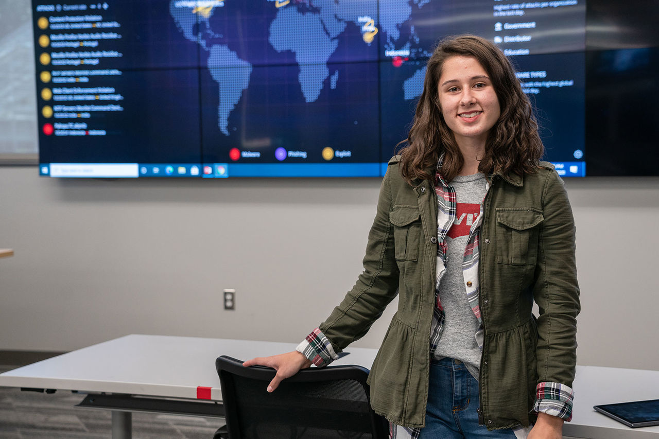 girl standing in computer room