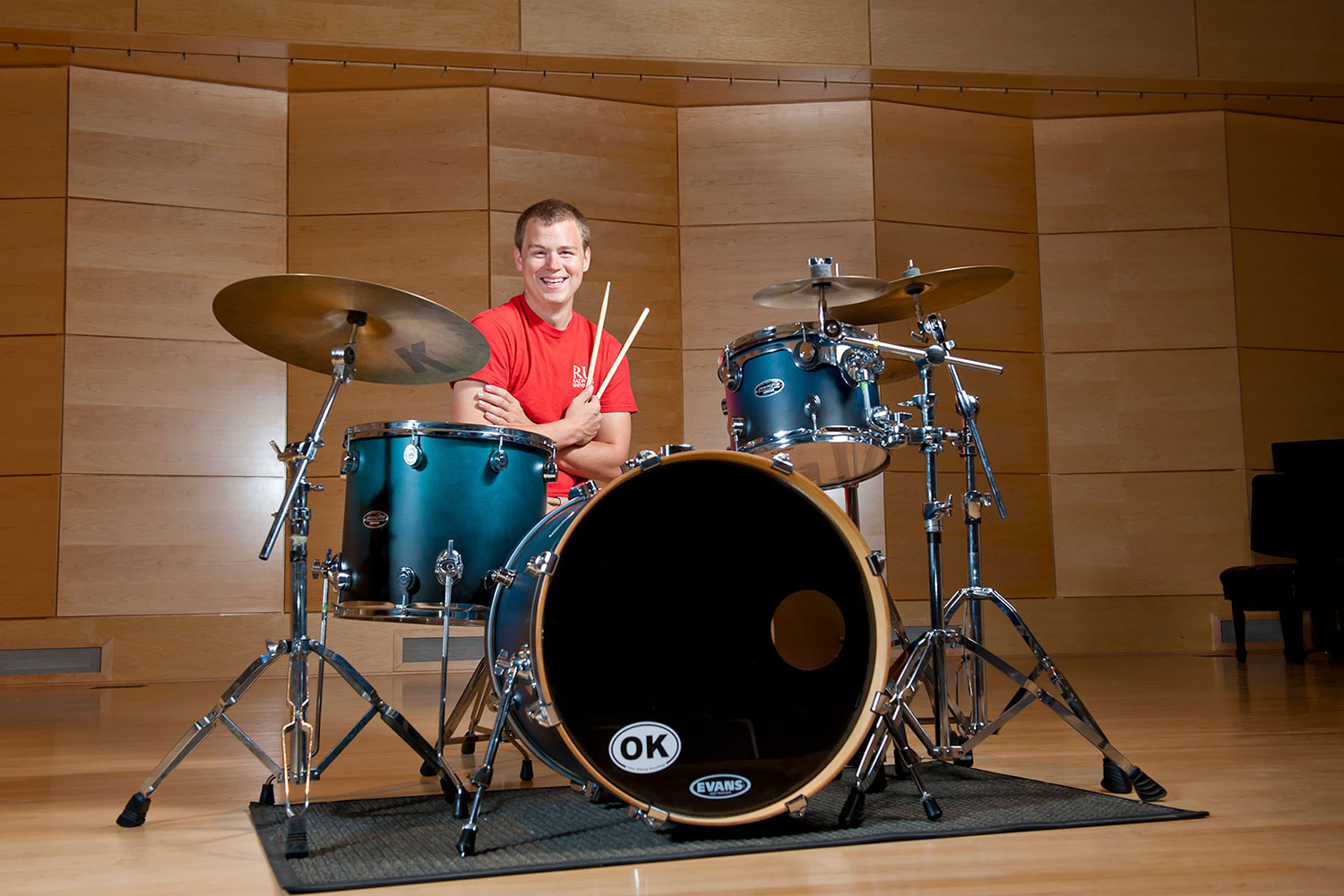 a male playing the drums