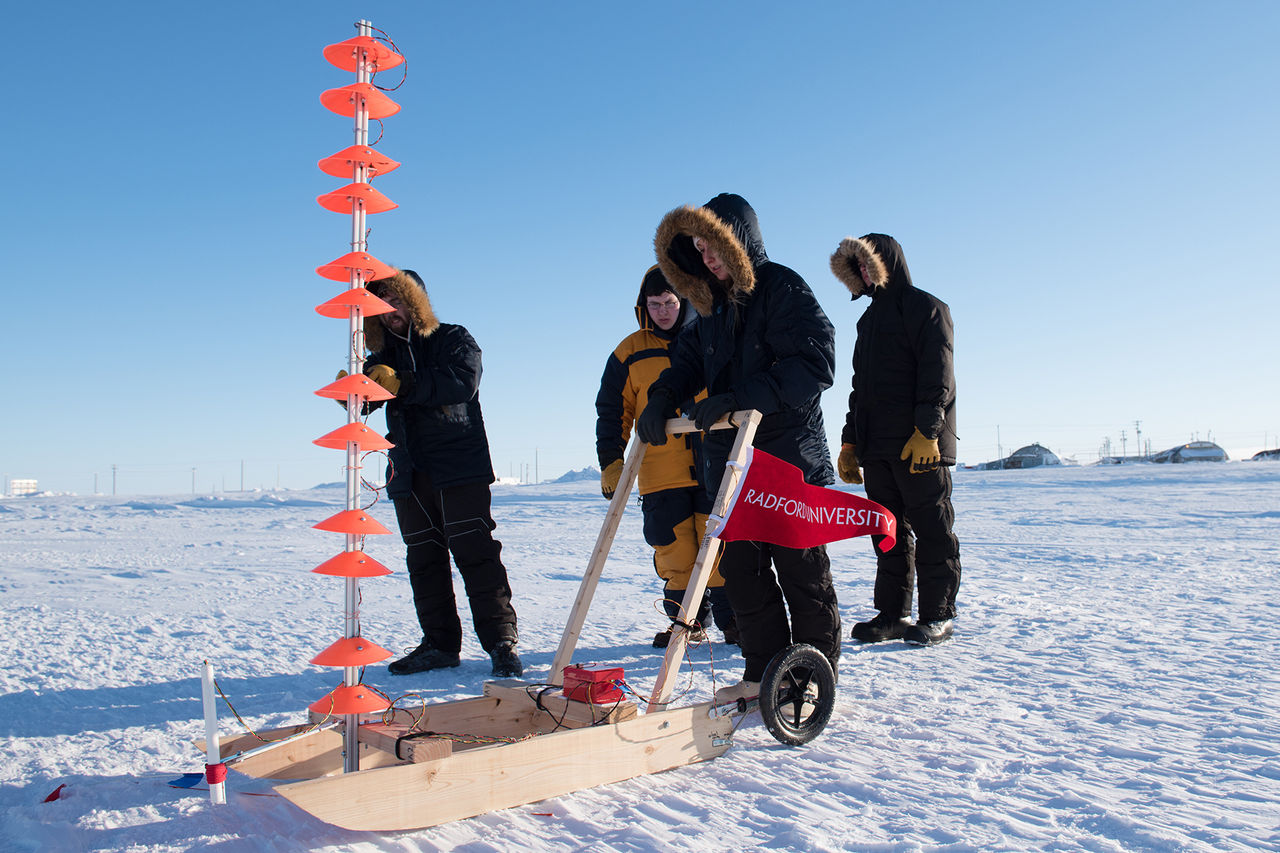 group of radford students in the snow with some equipment