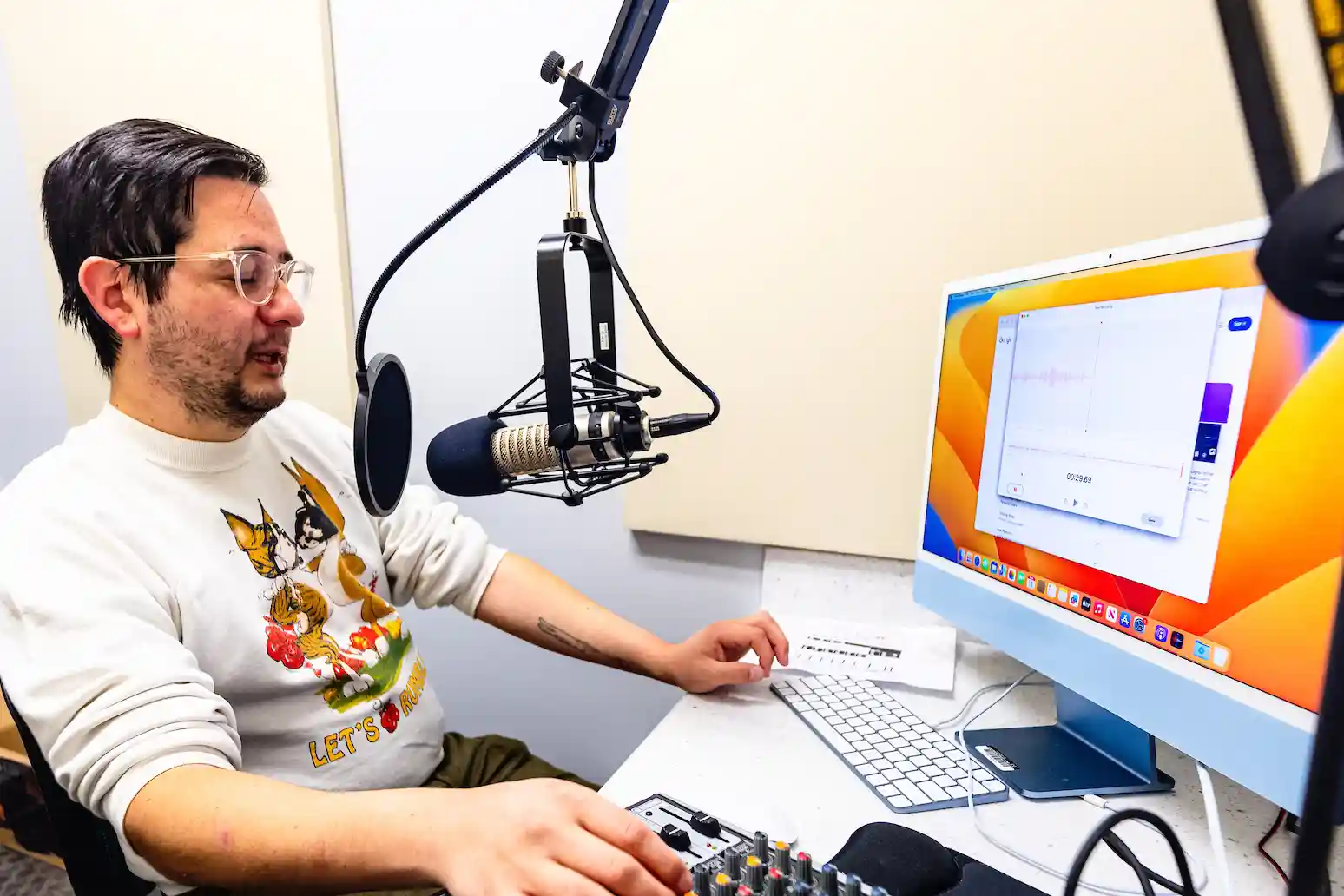 student in a communication computer lab