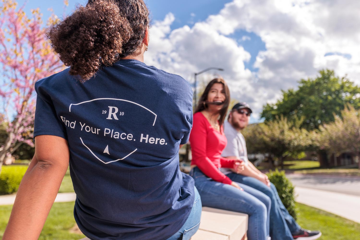 students sitting outside together