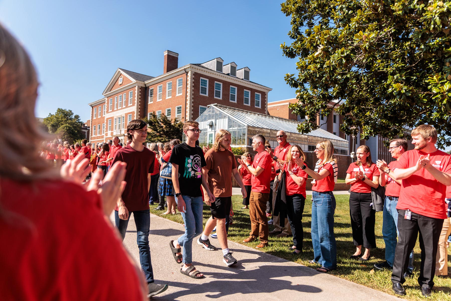 students walking into convocation