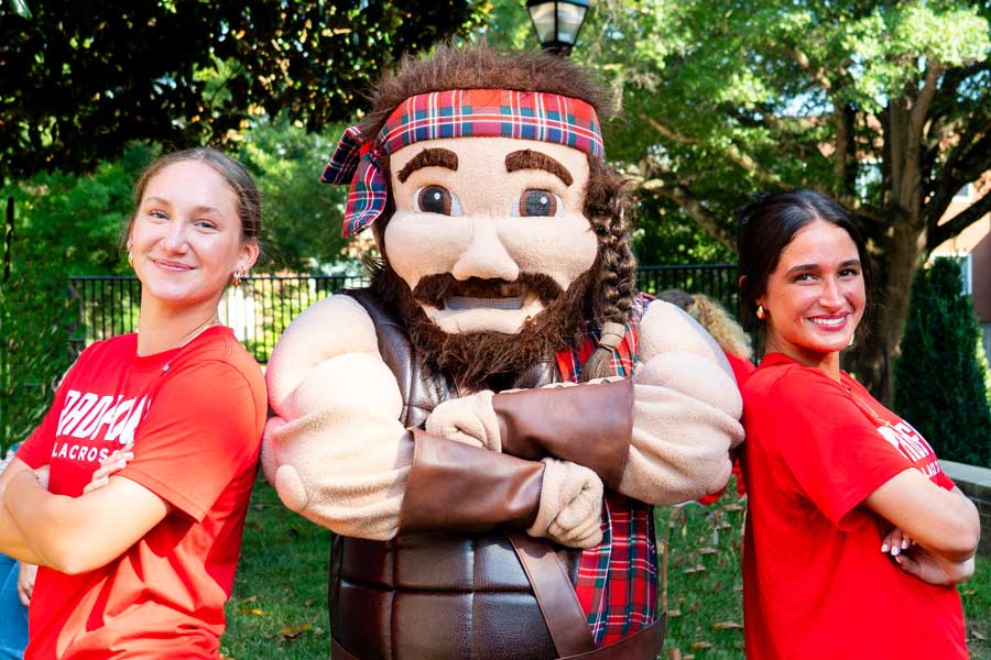 students with highlander mascot