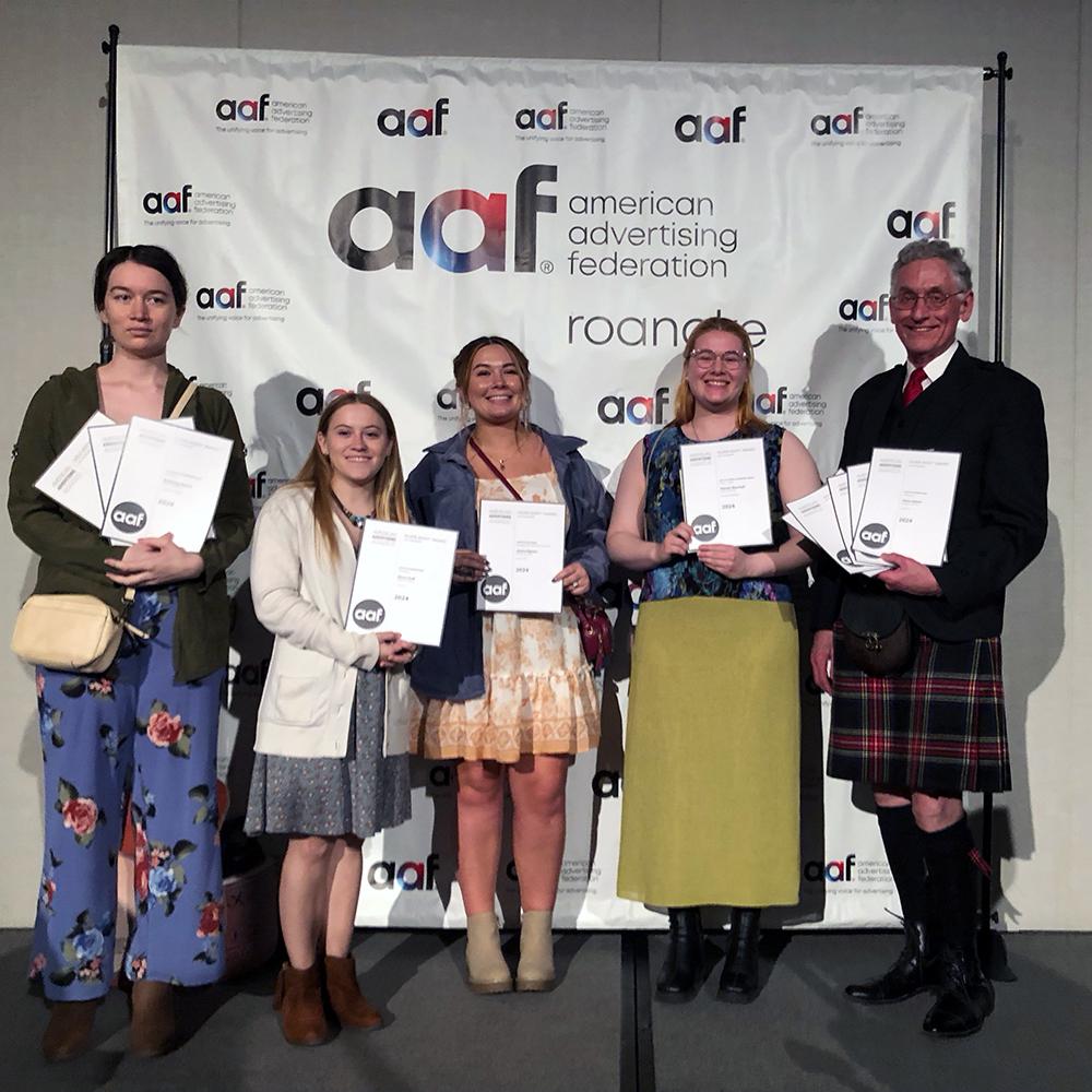 Ken Smith with student winners of the Addy awards