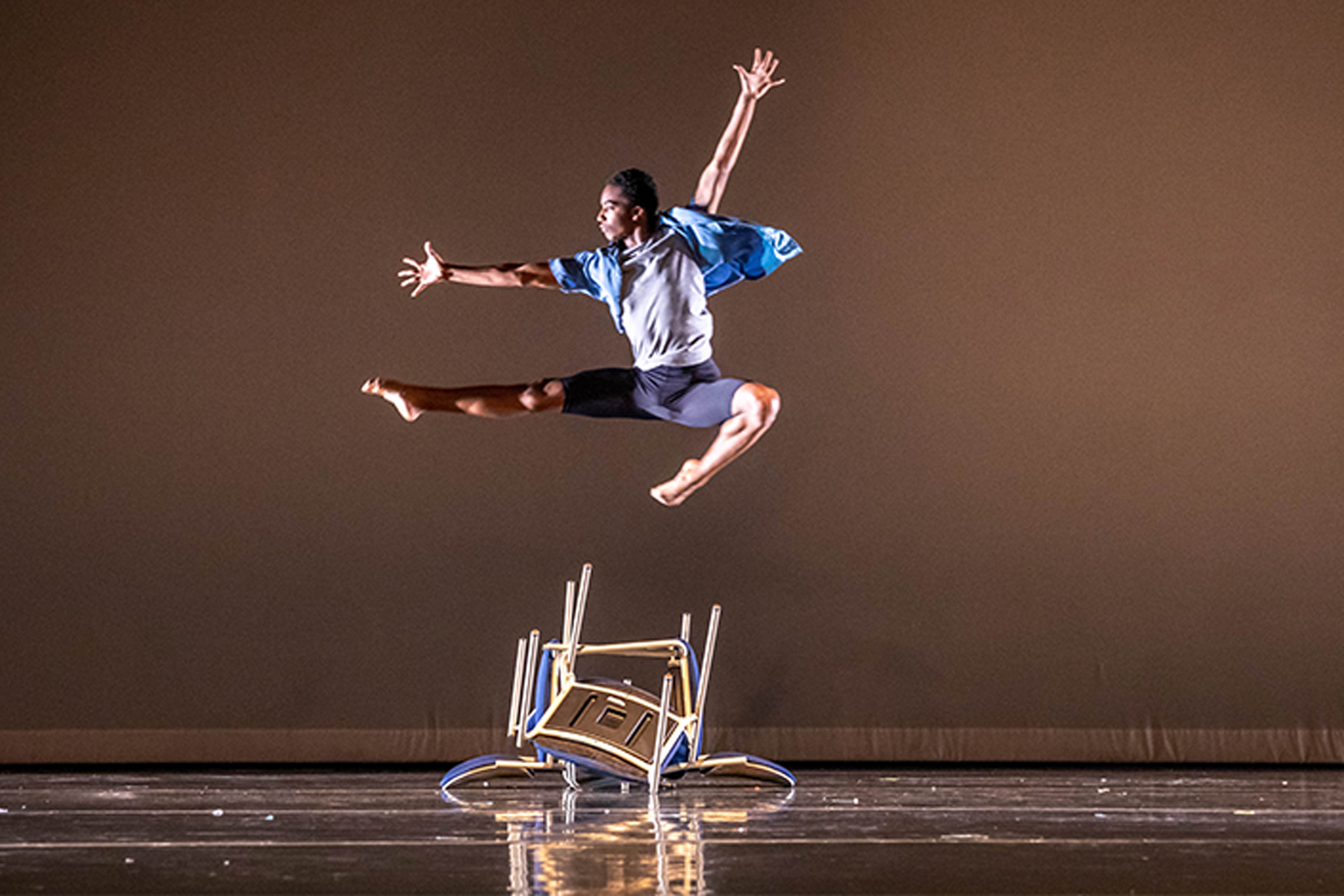 student dancing on stage