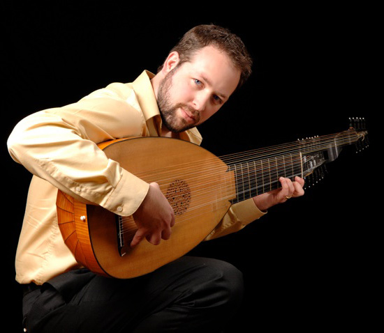 Man (Chris Wilke) performing on a baroque lute.